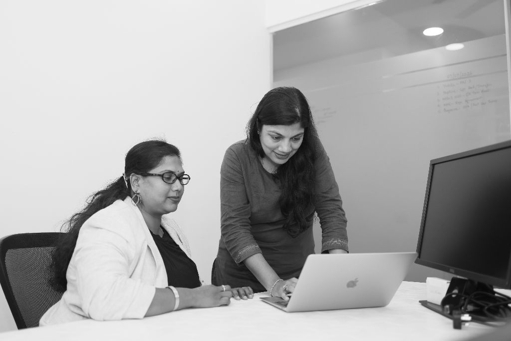 Asha Diwakar at work with team